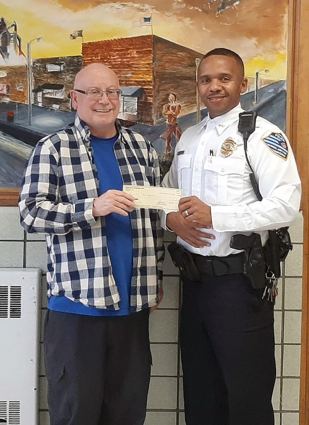 Helping Shop with a Cop program News, Sports, Jobs Weirton Daily Times